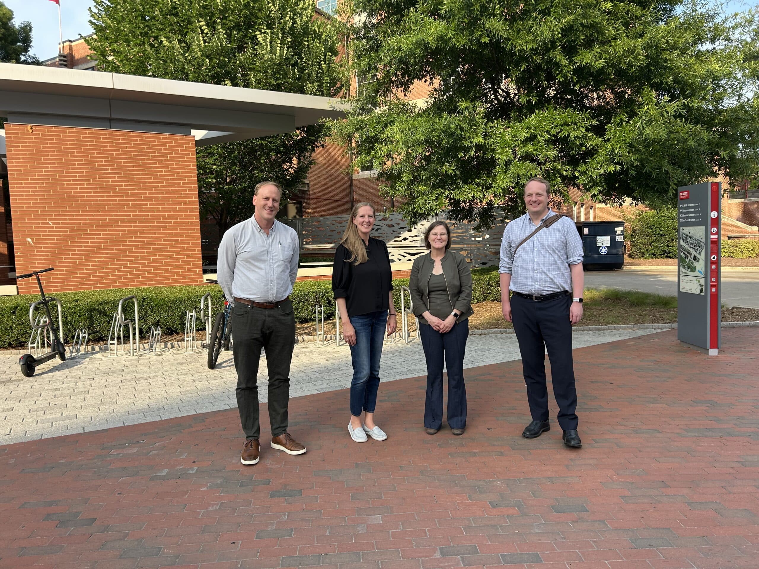 RTP directors and Lisa McFerrin form AWS